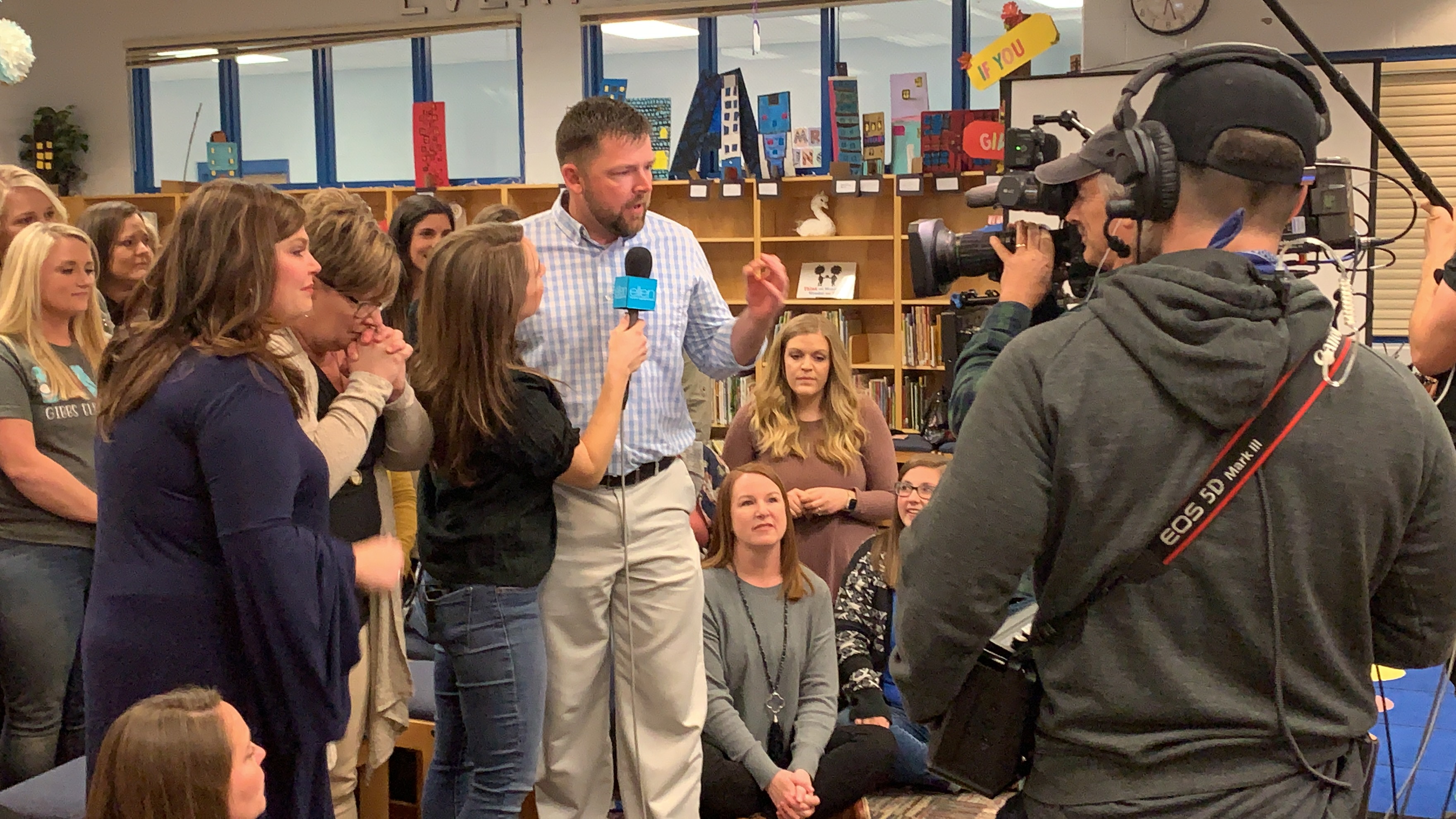 Jeannie Klisiewicz, a producer with The Ellen DeGeneres Show, interviews Gibbs Elementary Prinicipal Joe Cameron as part of a segment on the show. 